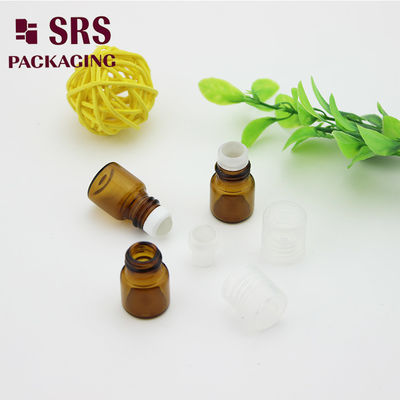 SRS खाली 1ml एम्बर ग्लास रोल पारदर्शी प्लास्टिक ढक्कन के साथ इत्र की बोतल पर